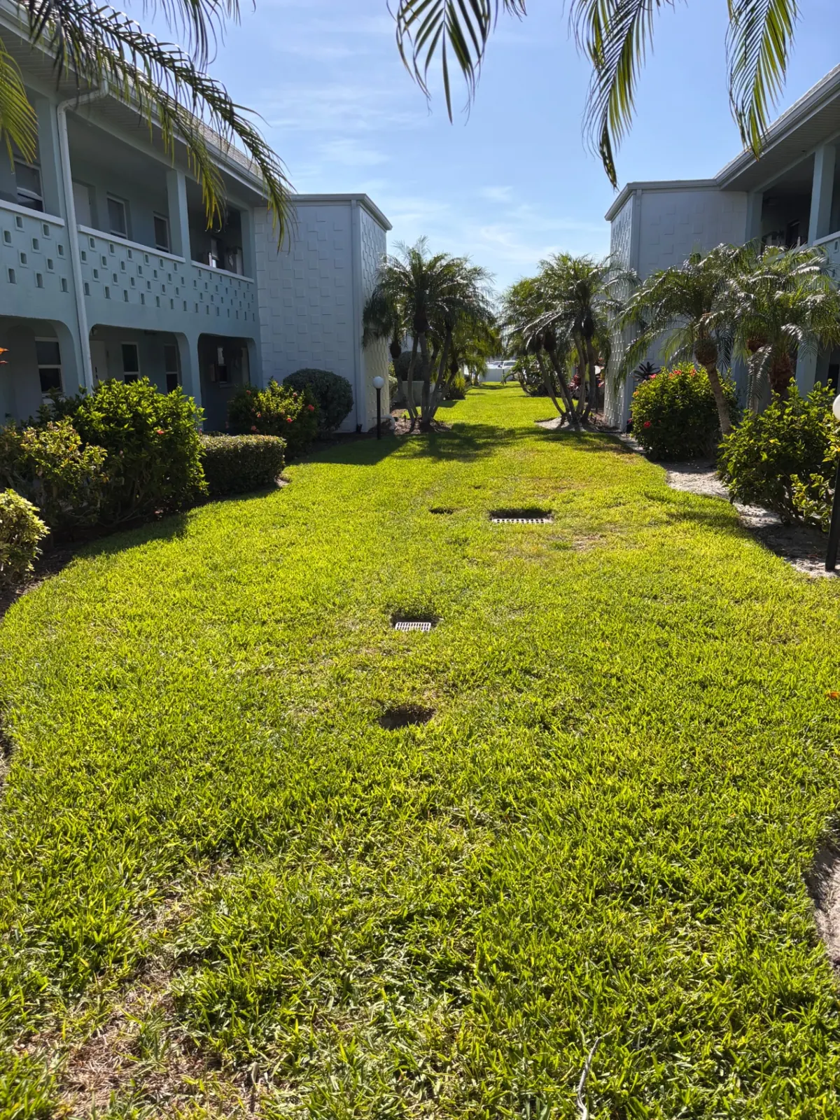 Waterfront Condo Community — commercial landscaping by JB Family Lawn Care